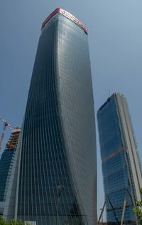 Low angle view of modern buildings against sky