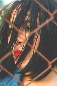 Close-up portrait of woman with hair