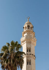 Low angle view of church against clear blue sky