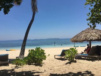 Scenic view of beach against clear sky