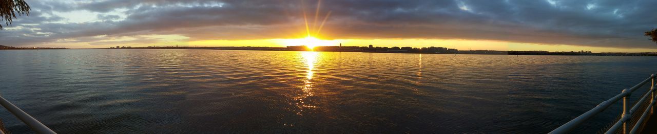 sunset, water, sun, sky, reflection, scenics, tranquil scene, beauty in nature, tranquility, sea, cloud - sky, sunlight, nature, idyllic, orange color, sunbeam, rippled, waterfront, cloud, horizon over water