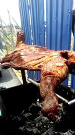 Close-up of meat on barbecue grill