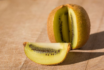 Close-up of lemon slice in plate on table