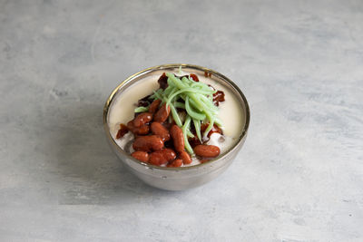 High angle view of salad in bowl on table