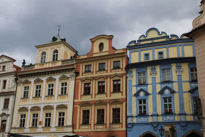 Low angle view of historic building against cloudy sky