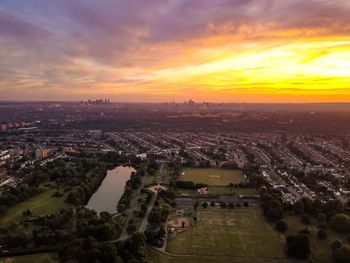 High angle view of townscape against sky during sunset