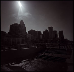 Buildings in city against sky