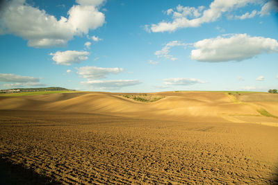 Scenic view of desert against sky