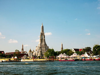 View of buildings in city against sky