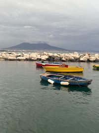 Boat in sea against sky