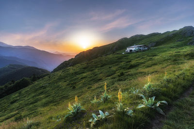 Scenic view of mountains against sky during sunset