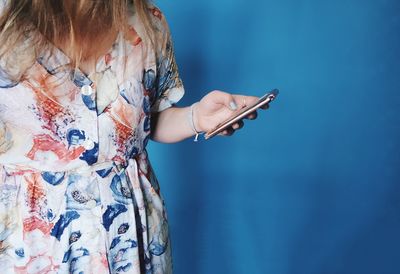 Close-up of woman using mobile phone