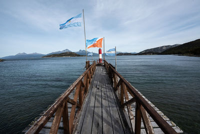 Pier over sea against sky