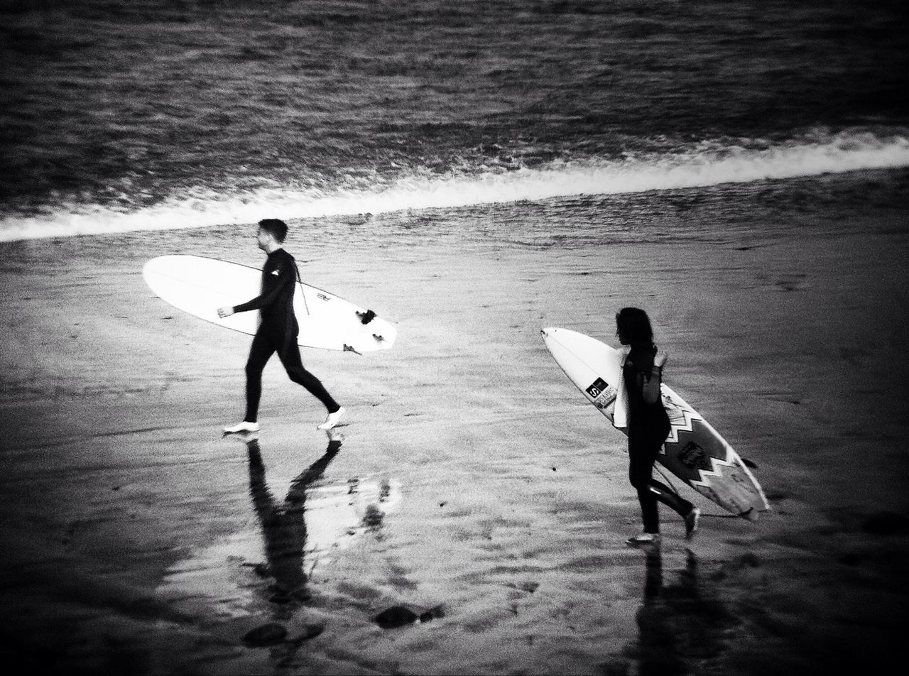 water, sea, beach, full length, shore, sand, horizon over water, men, silhouette, leisure activity, lifestyles, wave, shadow, high angle view, sunlight, nature, surfboard, boys