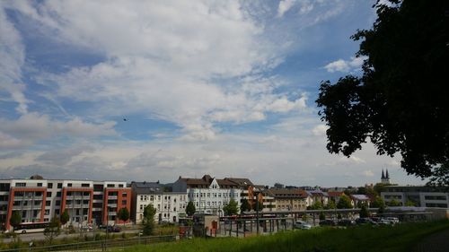 Buildings in city against sky