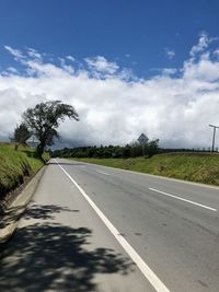 View of country road against sky