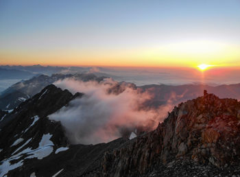 Scenic view of mountains against sky during sunset