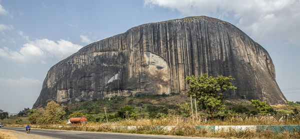 Rock formation on land against sky