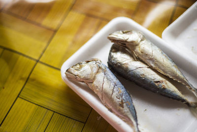Close up fried tuna fish in kitchen