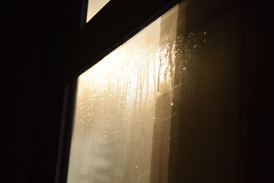 Close-up of wet window at home