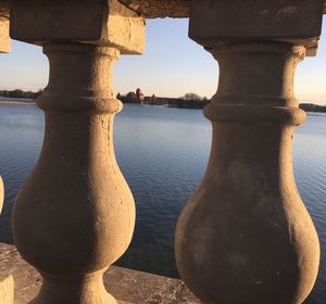 Close-up of lake against built structure