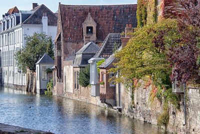 Canal amidst buildings in city