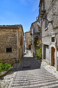 A narrow street of morcone, a medieval village in benevento province, italy.