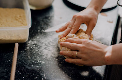 Midsection of man preparing food