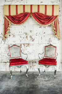 Chairs against wall