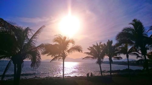 Scenic view of lake at sunset