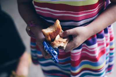 Close-up of man eating food
