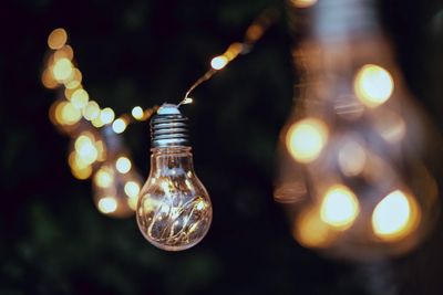 Close-up of illuminated light bulbs