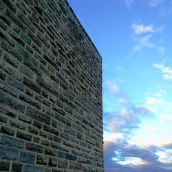 Low angle view of building against blue sky