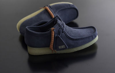 Close-up of shoes on table