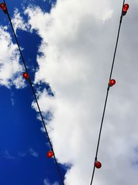 Low angle view of street light against sky