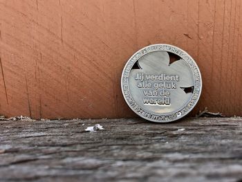 Close-up of coins on table