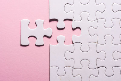 High angle view of jigsaw pieces on table