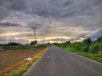Road against sky during sunset
