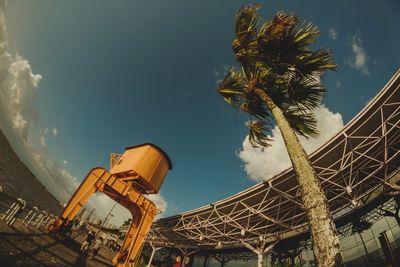 Low angle view of ferris wheel against sky