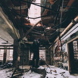 Man in abandoned room