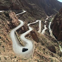 High angle view of tire tracks on road