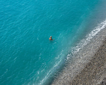 High angle view of woman in sea