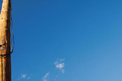 Low angle view of building against blue sky