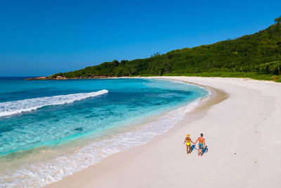 High angle view of beach against clear blue sky