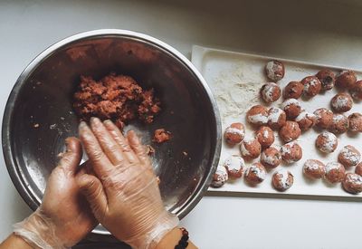 High angle view of person preparing food