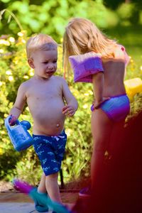 Portrait of boy standing outdoors