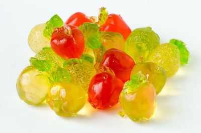 Close-up of fruits against white background