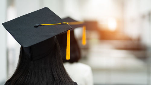 Close-up of person wearing hat