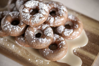 Close-up of donuts on cutting board