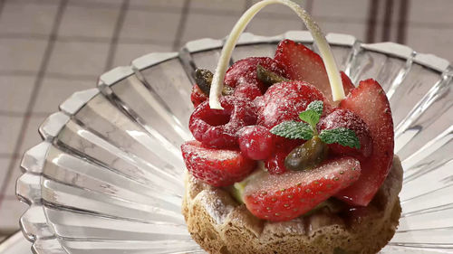 High angle view of strawberries on cake